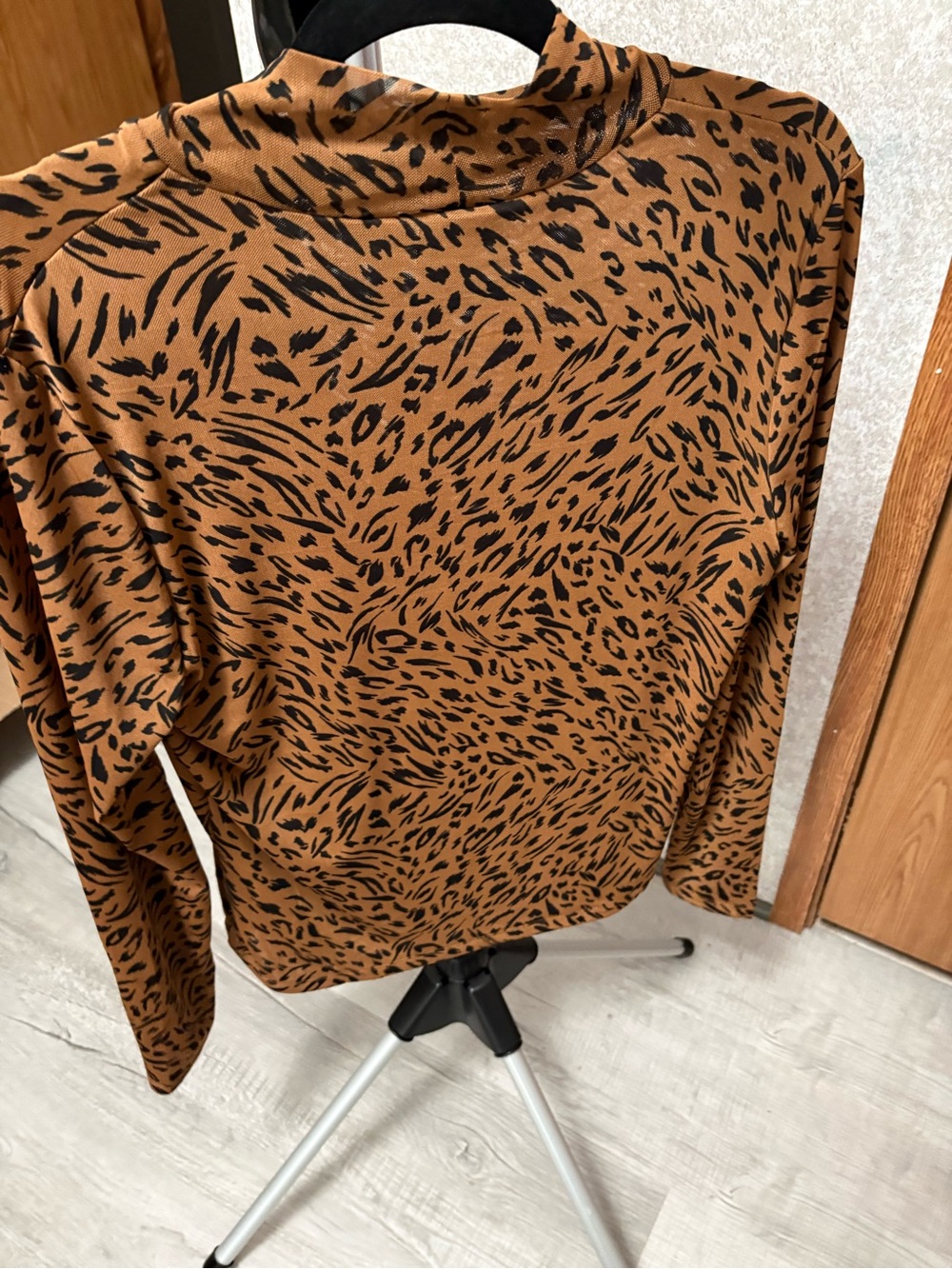 Animal Print Mock Neck Top in Brown and Black. By A new day.